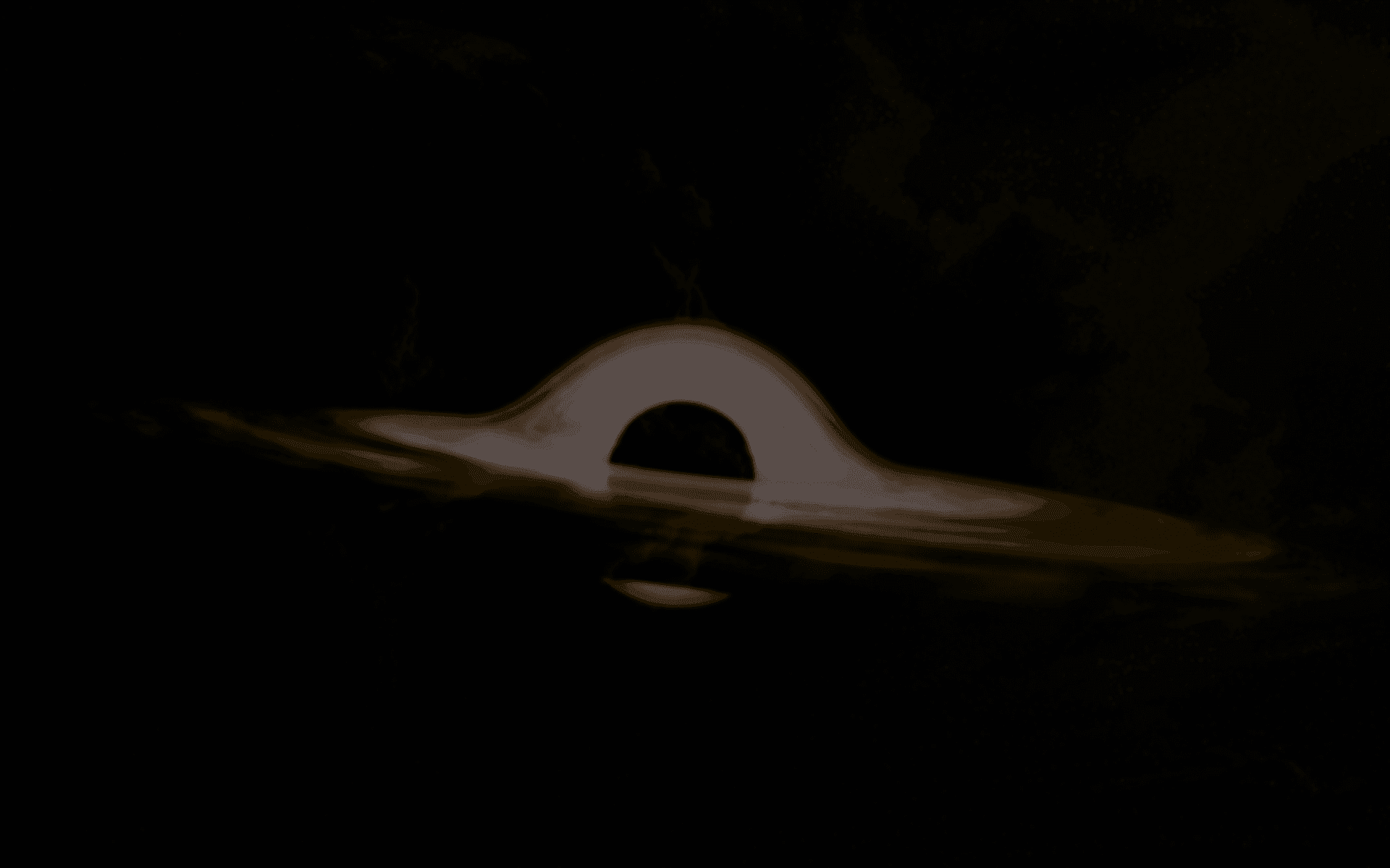 a black hole in the middle of a space filled with stars