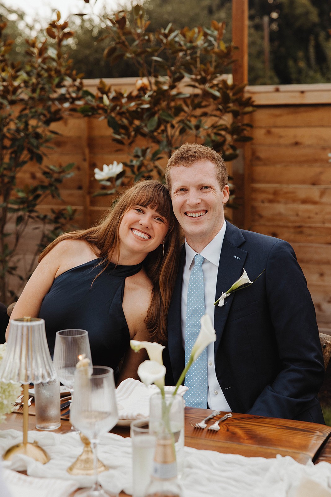 person sitting in a chair in front of a man