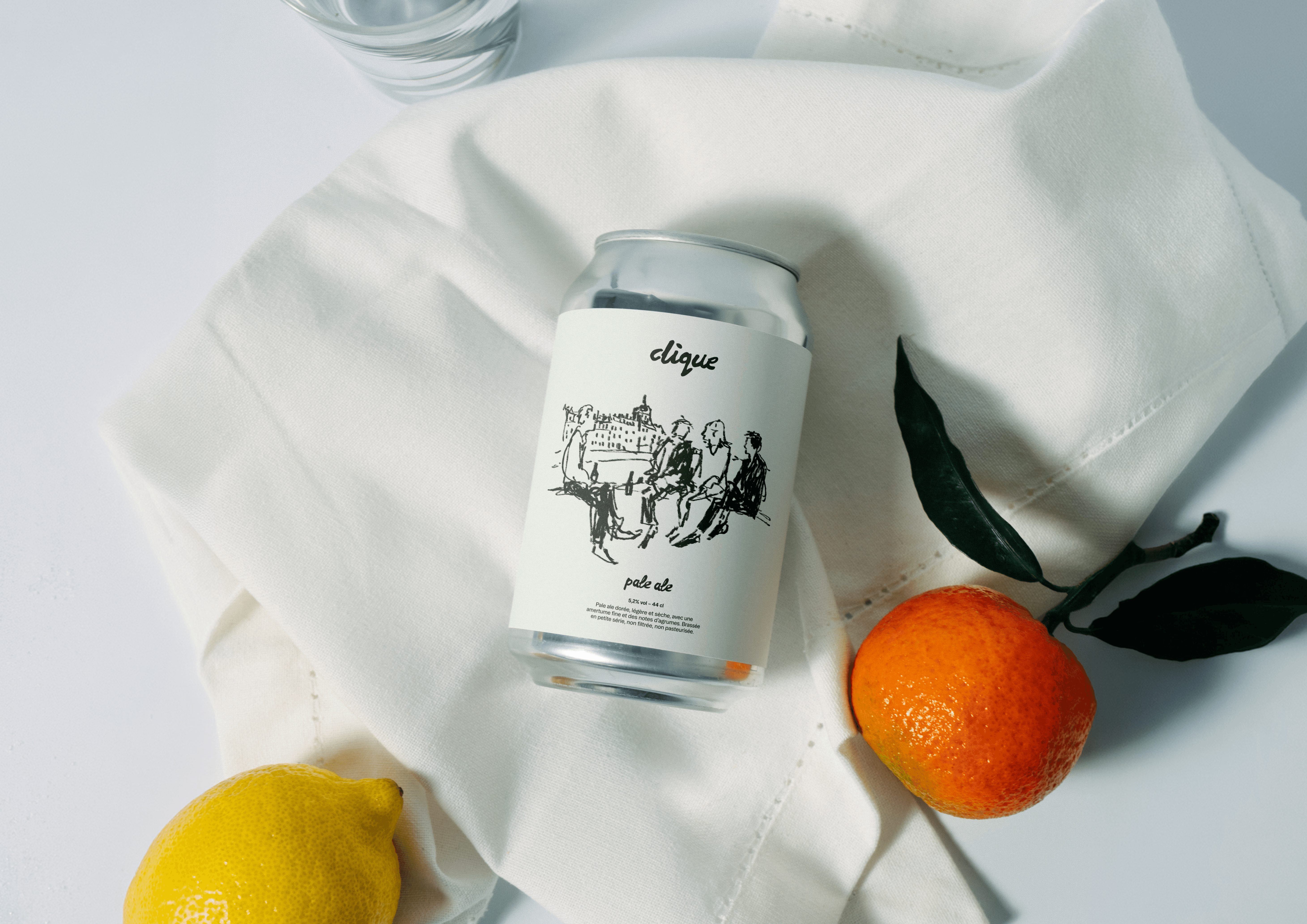 Stack of modern books and magazine with minimalist cover design on leather chair