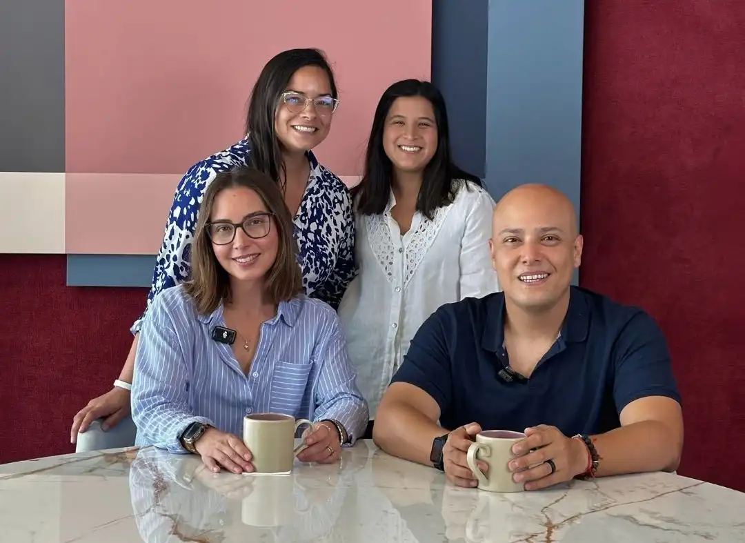 man in black crew neck t-shirt and blue shorts holding woman in white and red