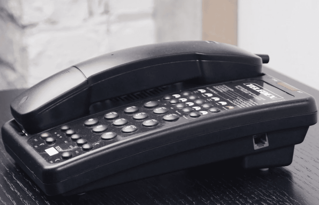 Cetis Teledex Opal Bedroom phone (Black) on bedside table