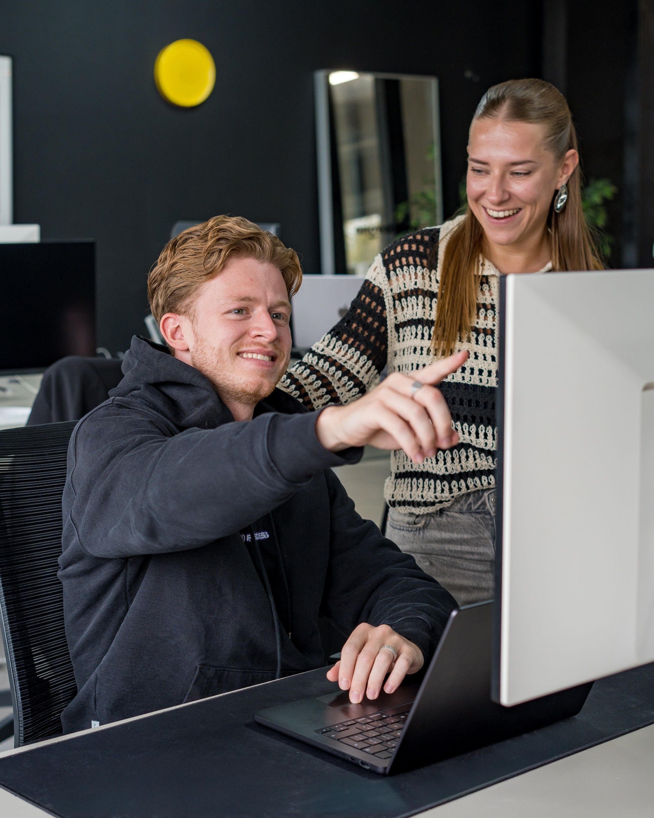 woman scrolling through content on her iphone