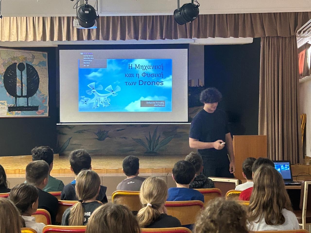 A drone flies against a snowy, blurry backdrop.