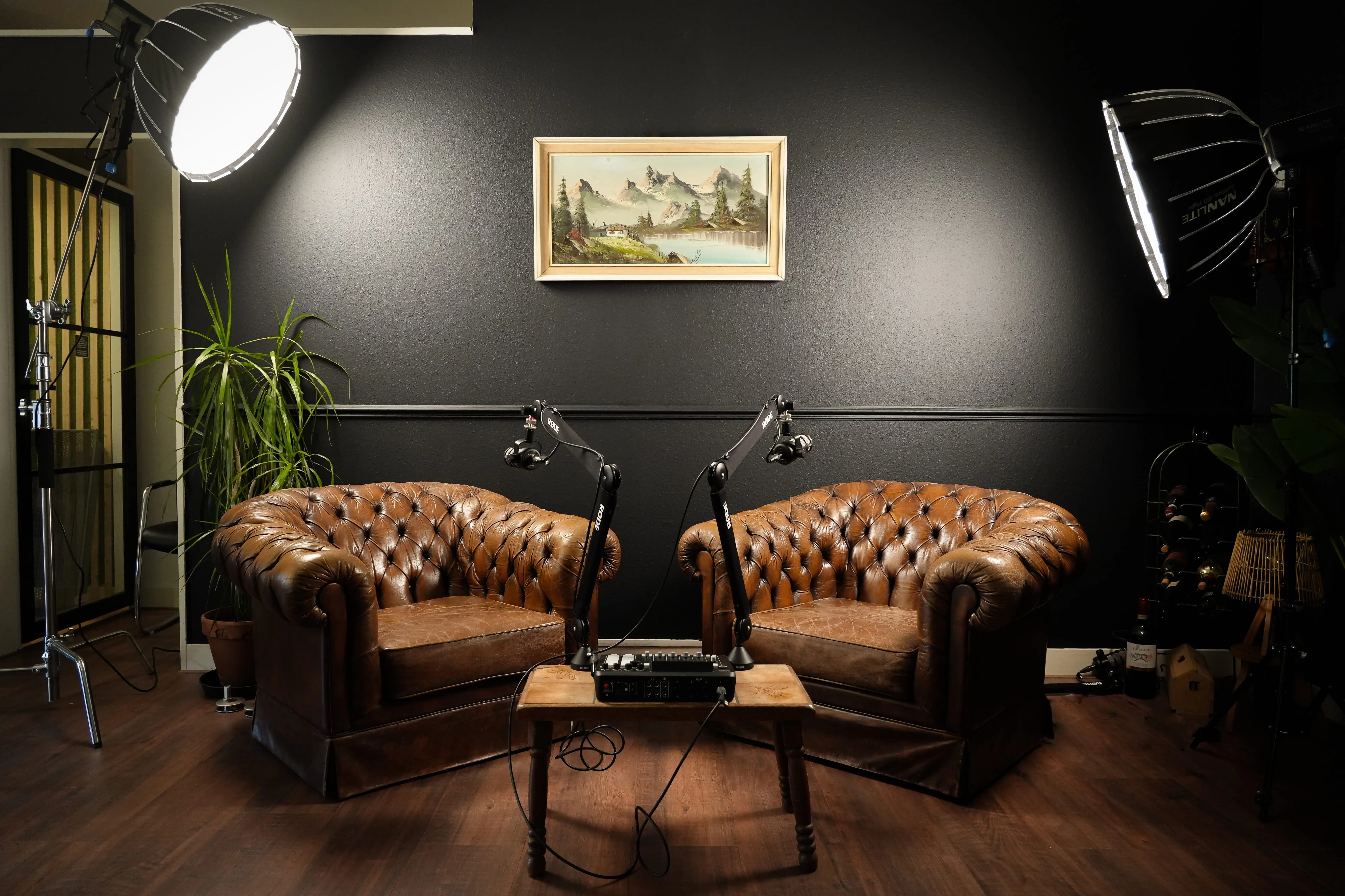 a neon sign hanging from the side of a wall