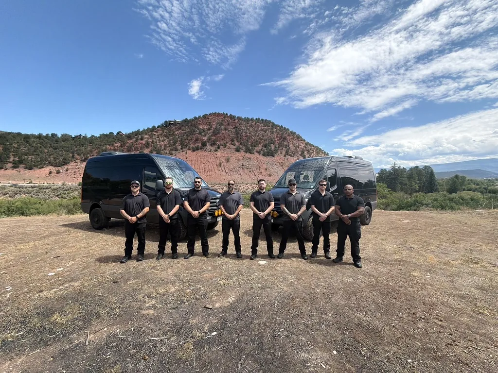 Cameron James Group protective team lined up in front of two Sprinters in the Roaring Fork Valley