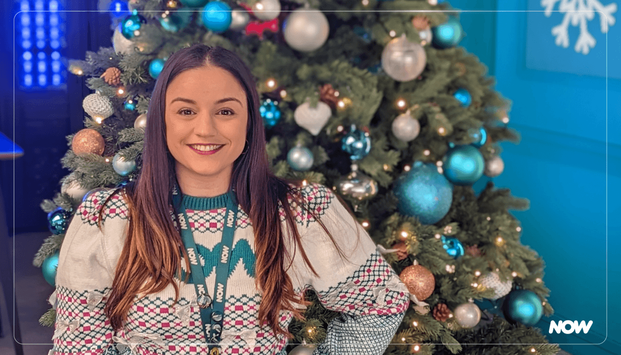 Creative portrait with geometric pink eyewear and bold fashion styling in urban setting