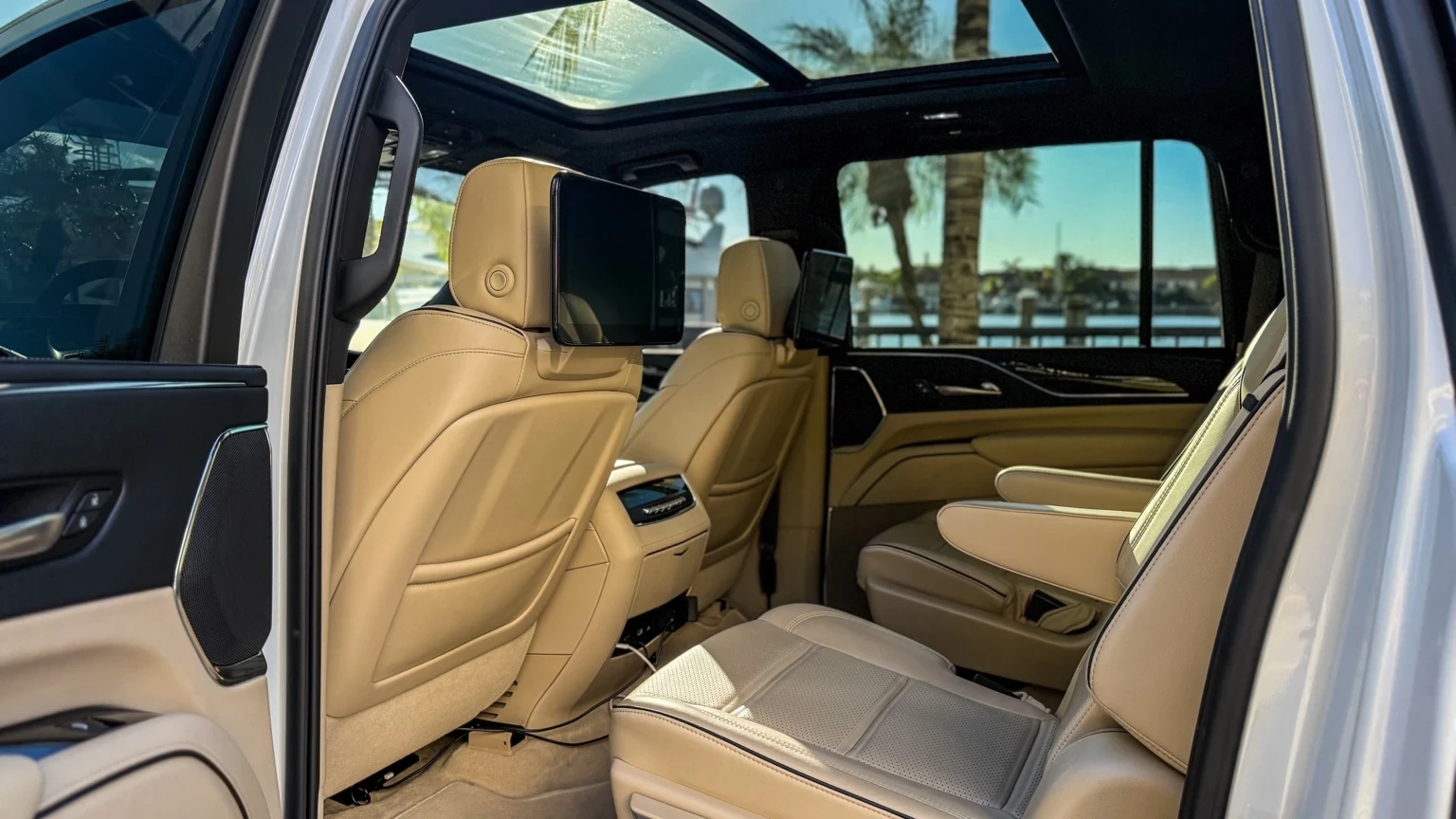 Cadillac Escalade ESV beige leather captain chairs and panoramic roof