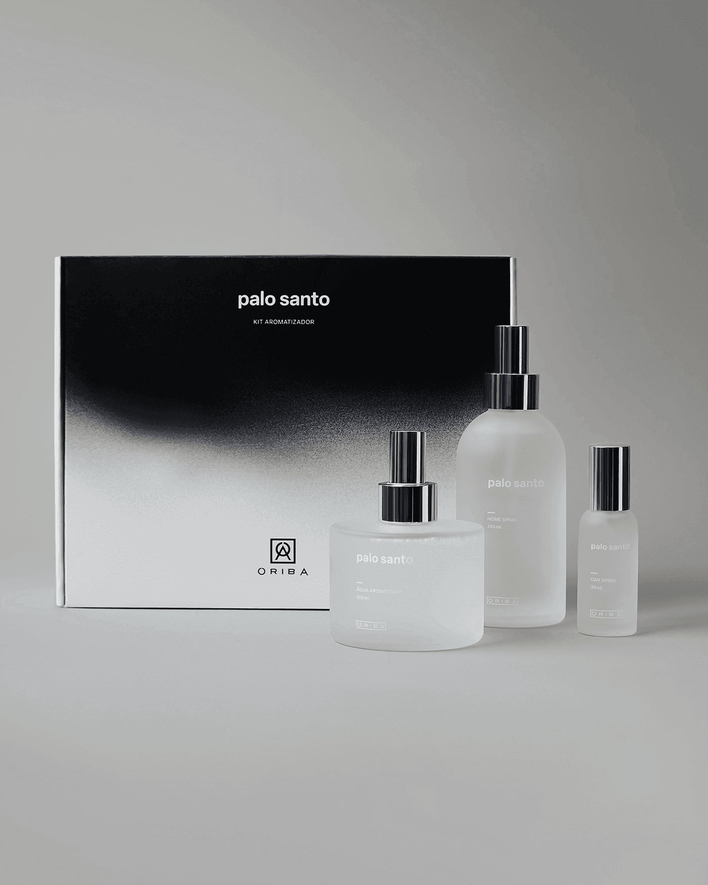 Black and white image of people working at a table with laptops, showing hands gesturing during discussion of digital content displayed on screens, with fabrica® logo in the corner.