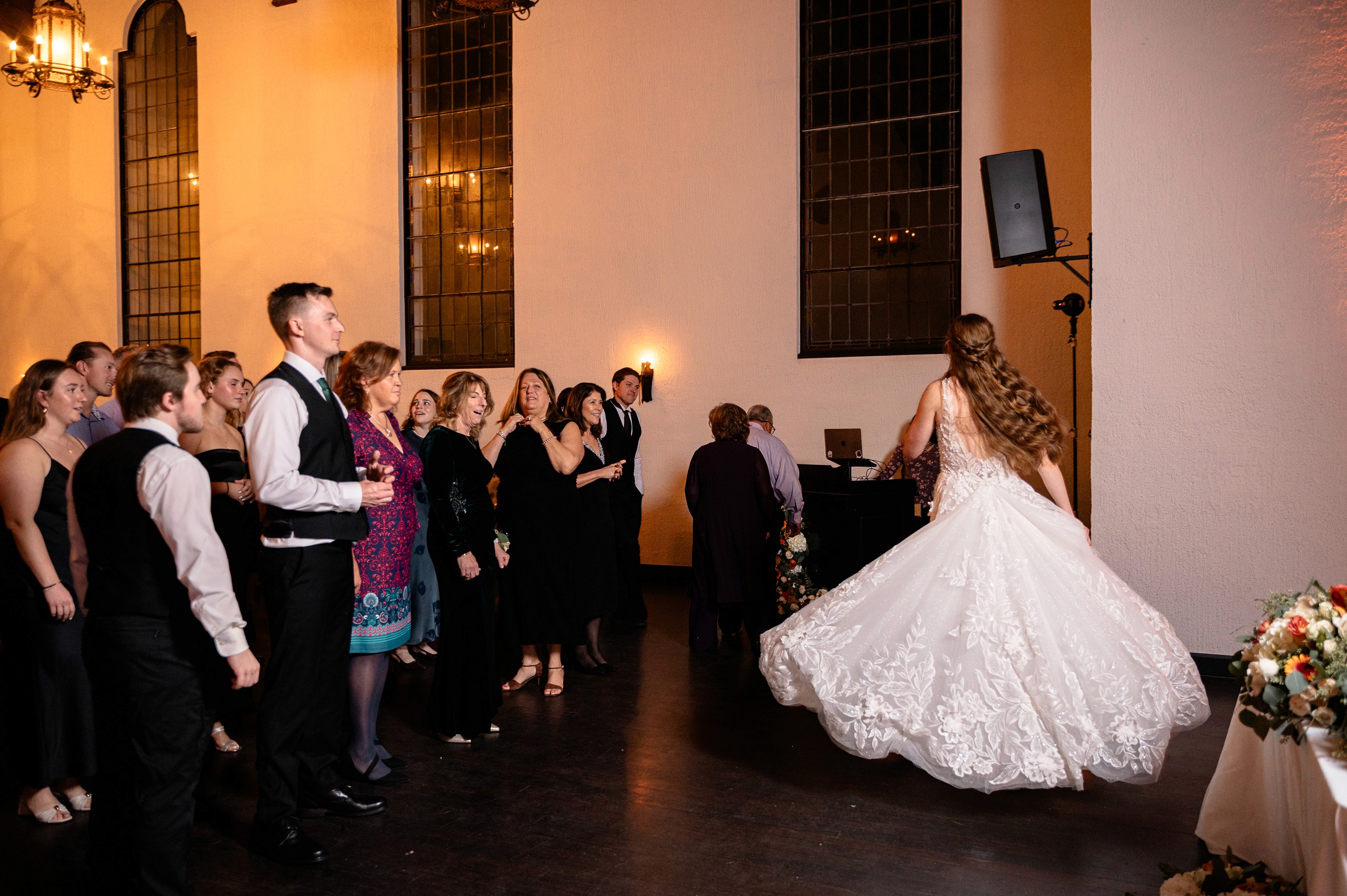 Flat lay wedding details with bouquet, rings, and sparkling bridal heels