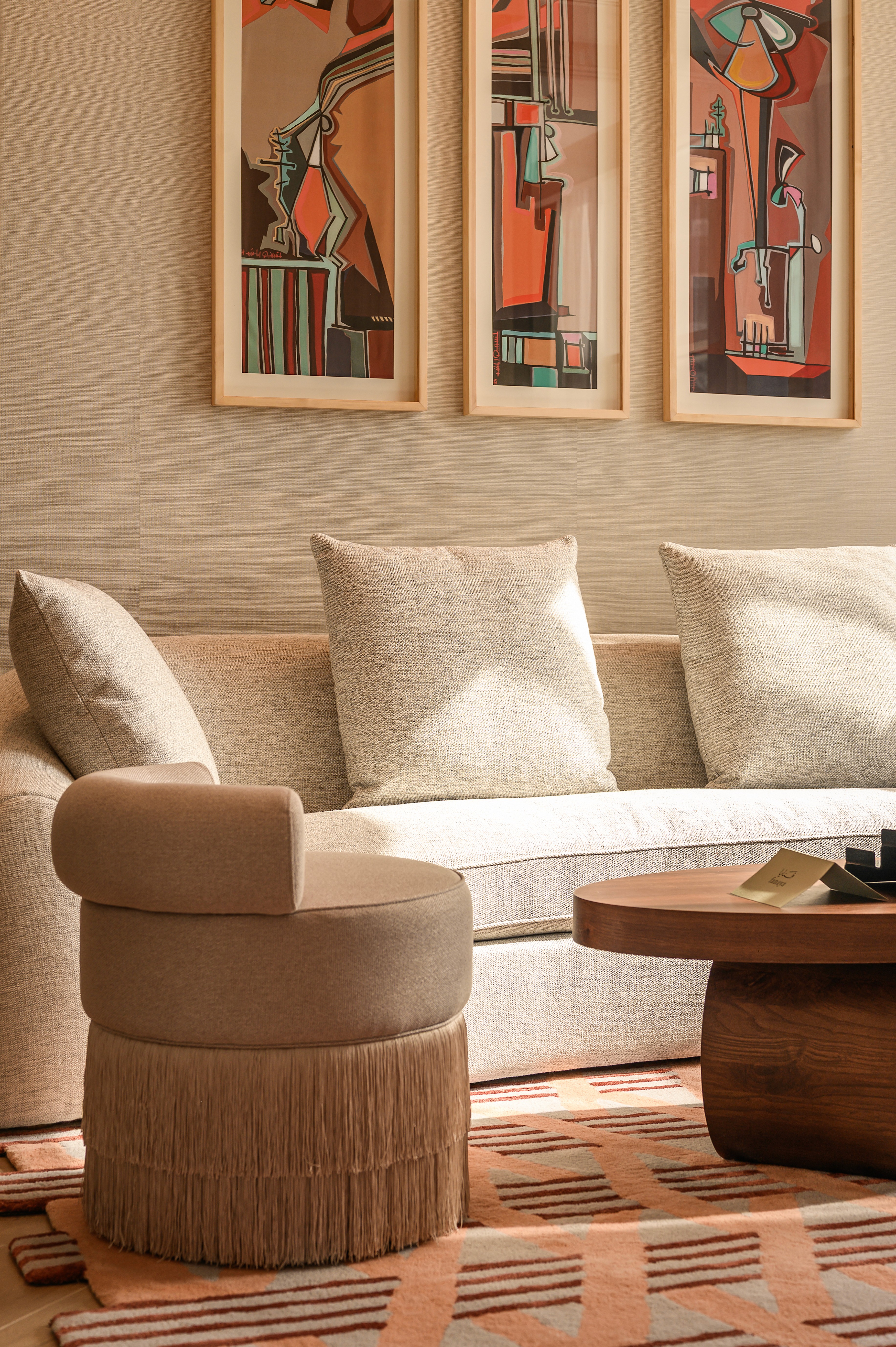 A group of people praticing yoga on the beach in the morning