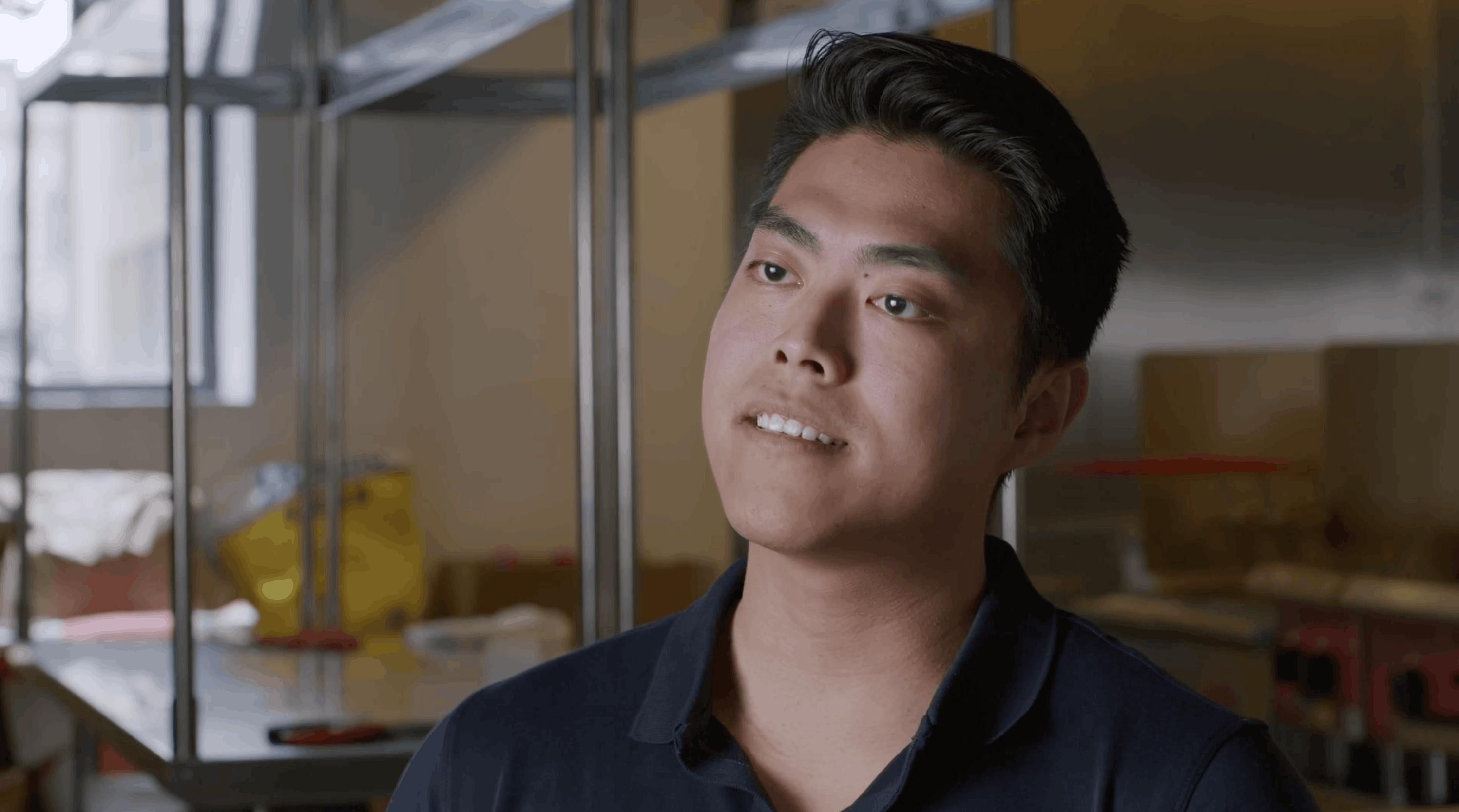 Restaurant owner sitting inside his commercial kitchen for CloudKitchens testimonial
