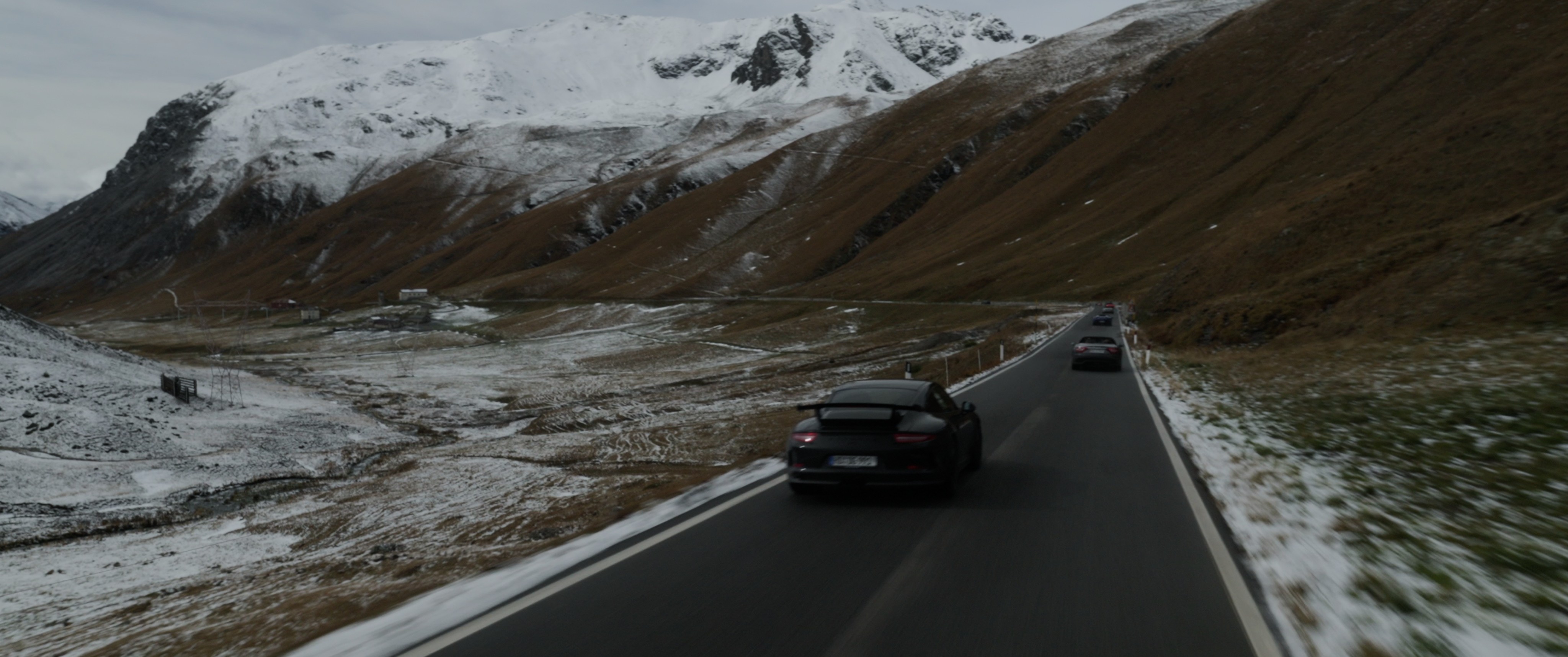 Streetside billboard with flyposters of the Batch.Works brand and illustrations