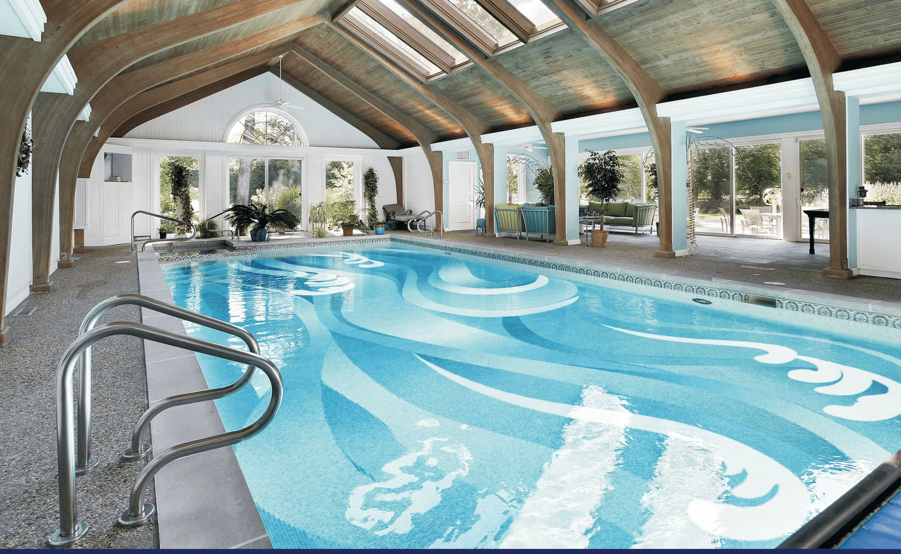 A modern gallery space with a geometric abstract painting on a white wall