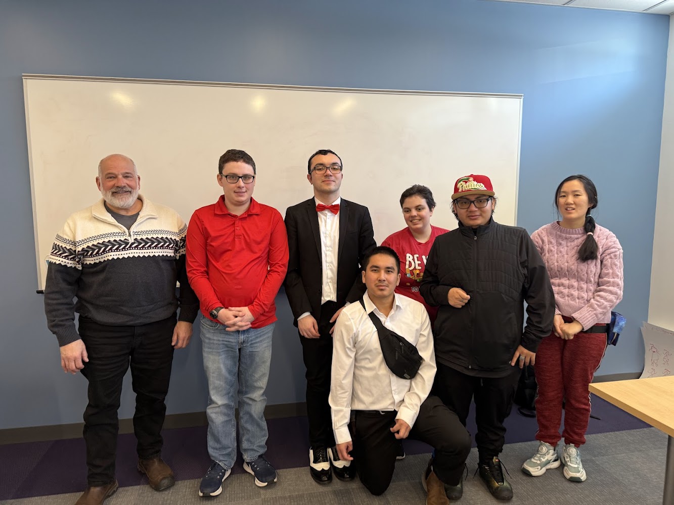 Students looking at a computer