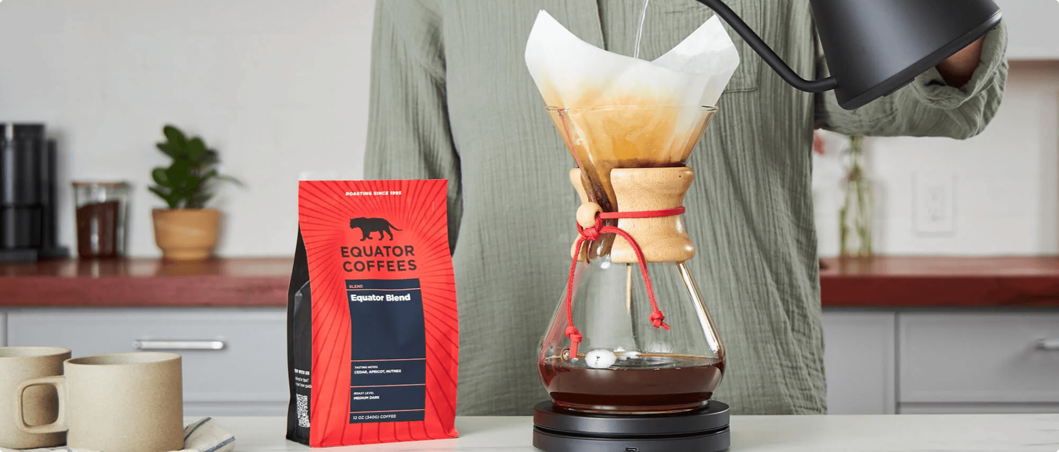 Shopify hero image for Equator Coffees featuring pour-over coffee brewing and packaged coffee
