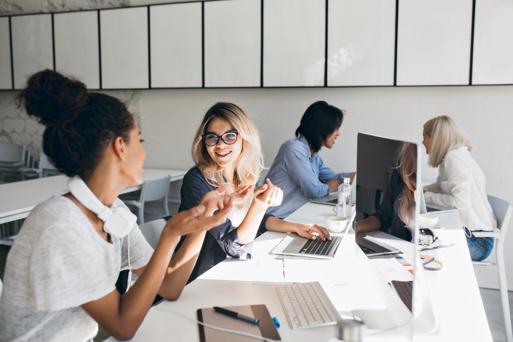 Women IT professionals collaborating on network infrastructure design for growing businesses in London
