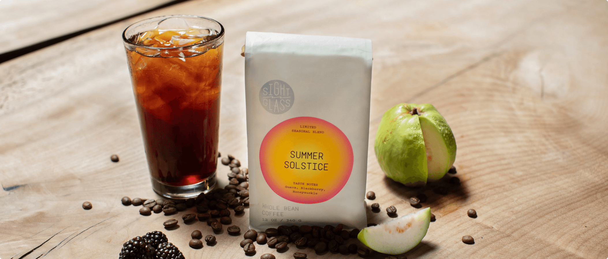 Shopify hero image for Sightglass Coffee featuring iced coffee and whole bean coffee packaging