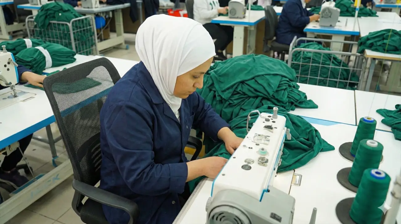 employee who works on the knitting machine.