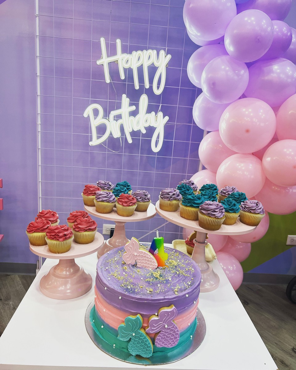 A young girl smiling