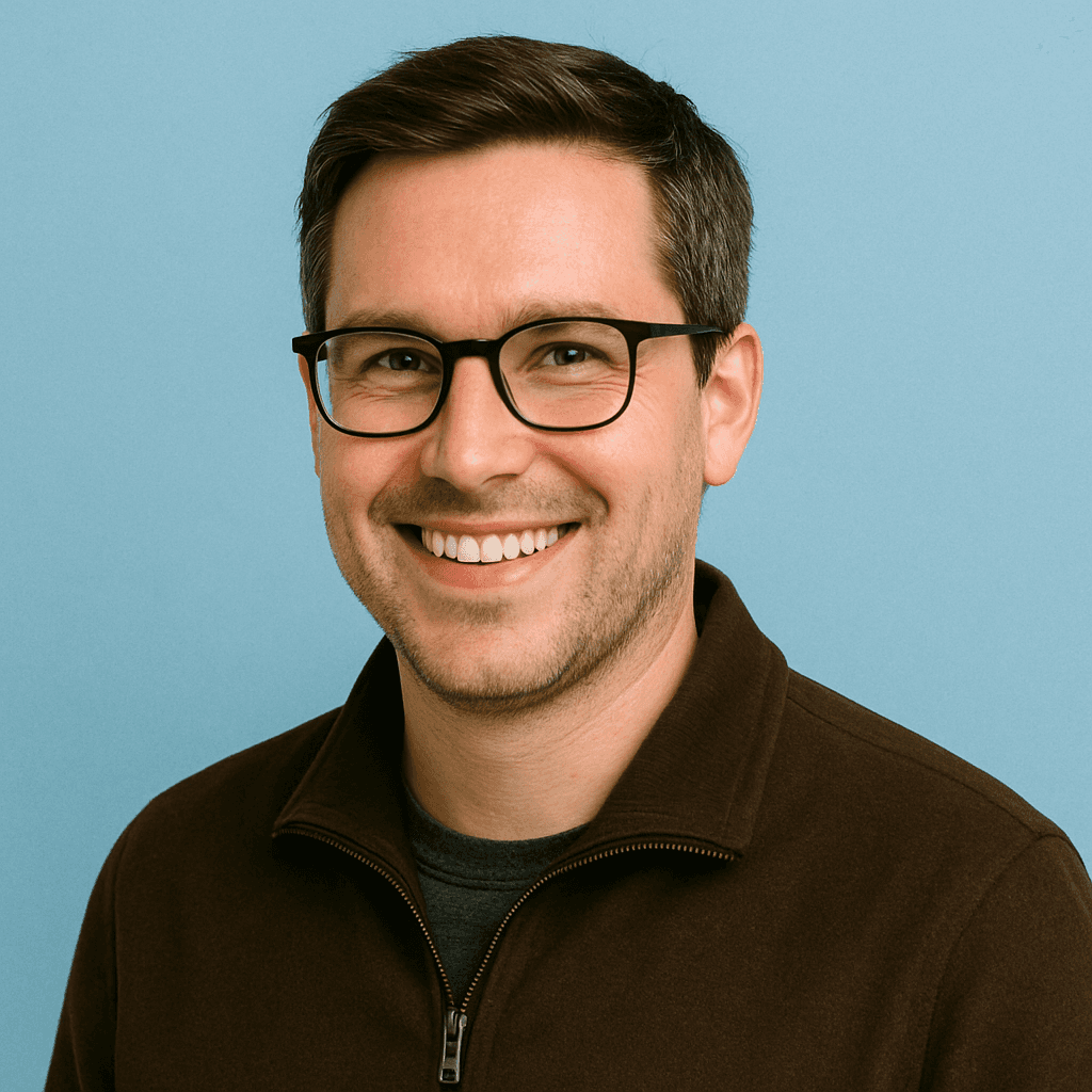 man wearing green crew-neck top and eyeglasses with black frames looking at side