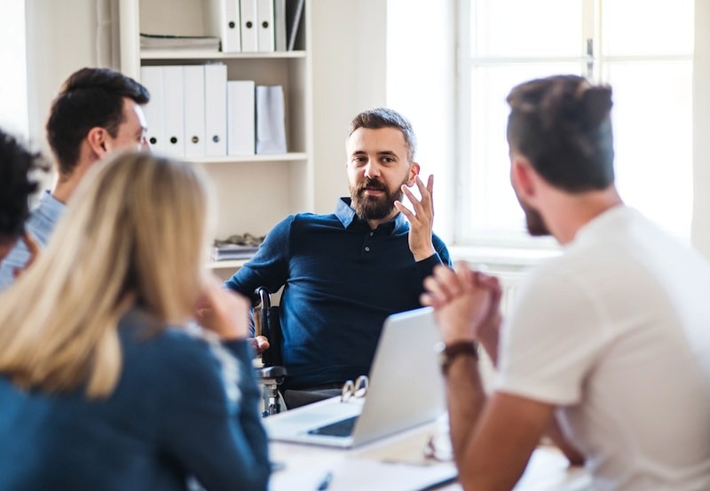 Man discussing new ideas inside meeting room