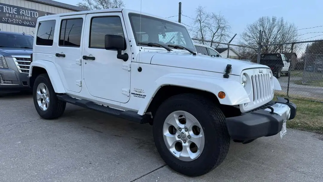 front of a white jeep