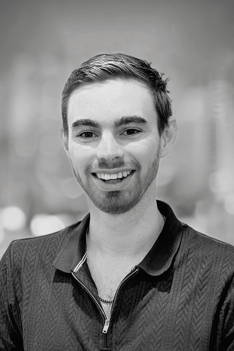 Portrait of Stephen McCowage, Senior Industrial Designer + Studio Manager, wearing collared shirt