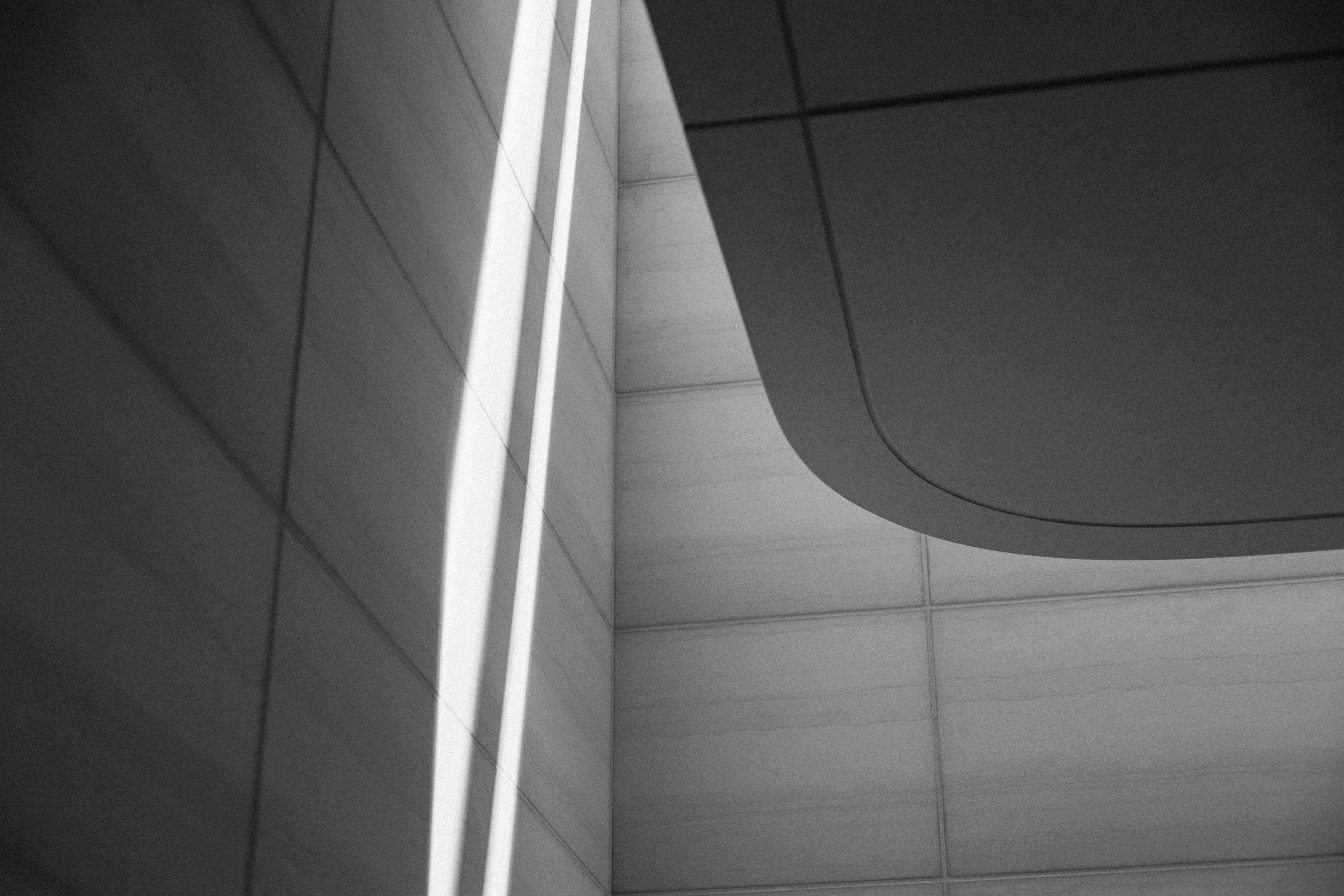 A black and white photo of a bathroom