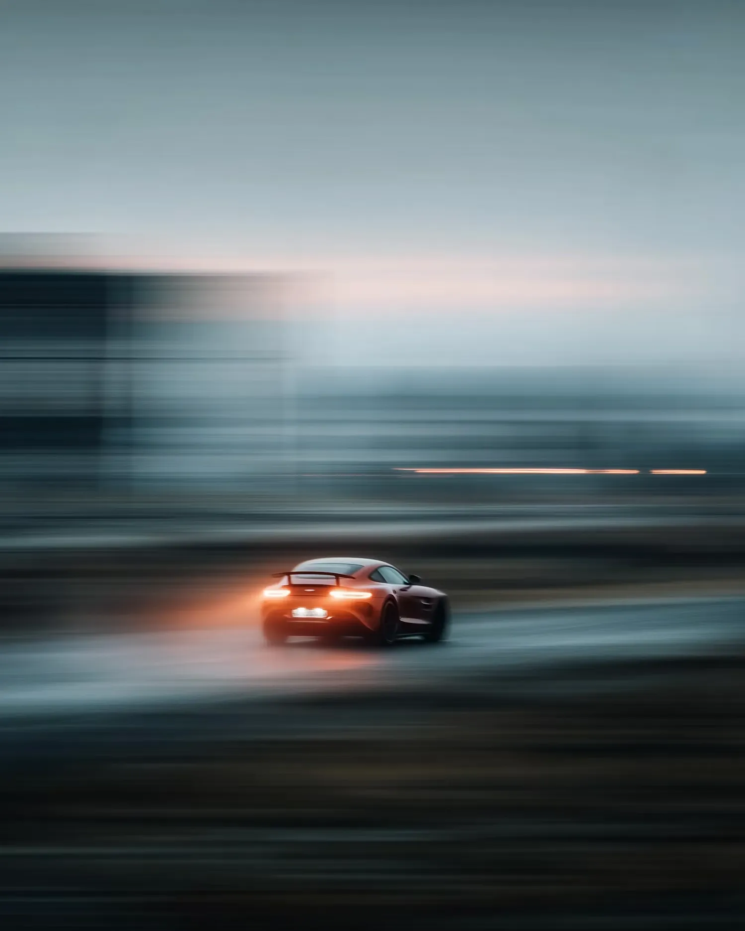 Red Sports Car in Motion