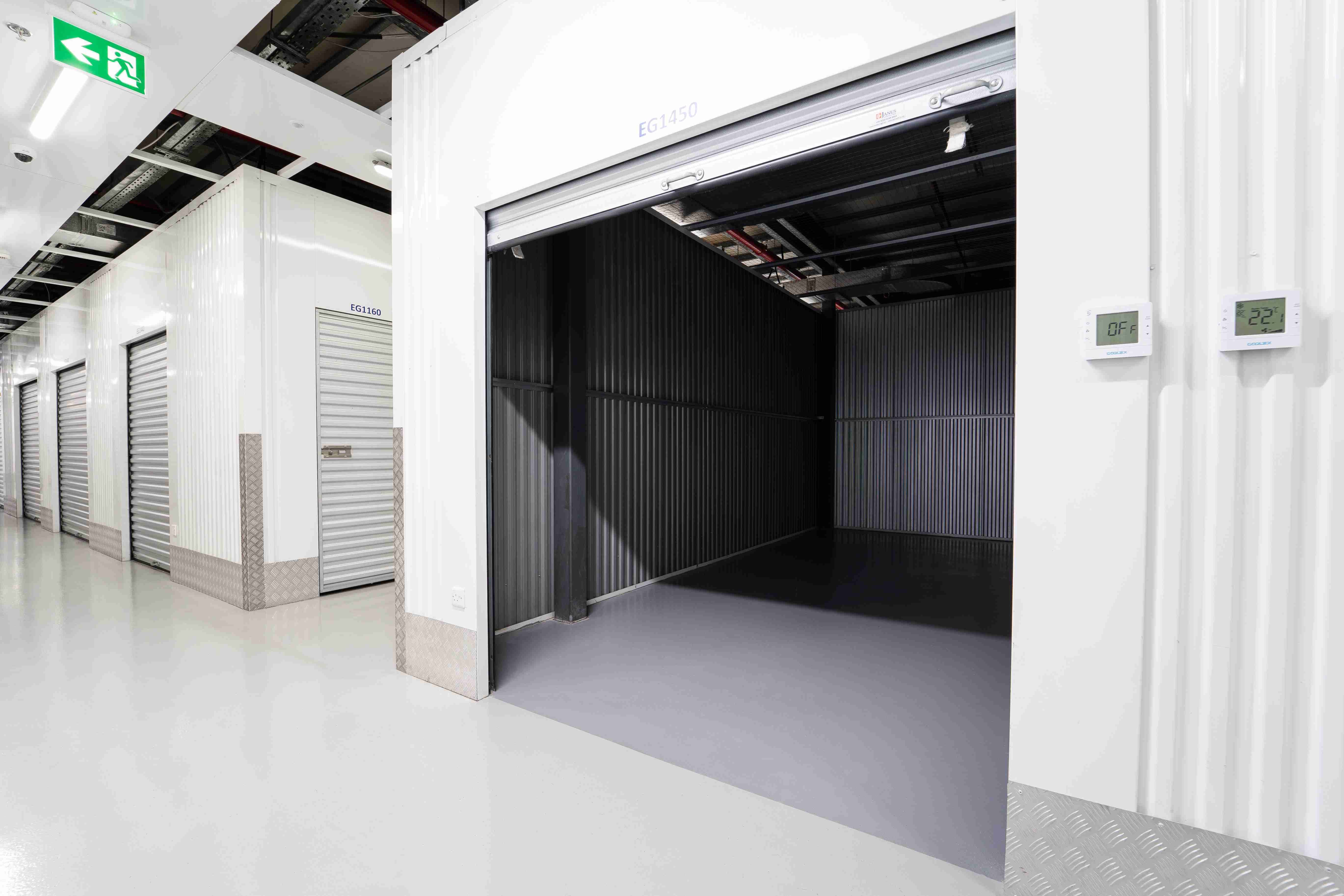 Open unit with metal walls and temperature display inside a modern storage facility Dubai.