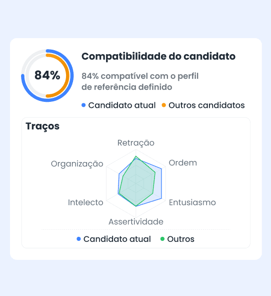 a woman shaking hands with another woman sitting at a table