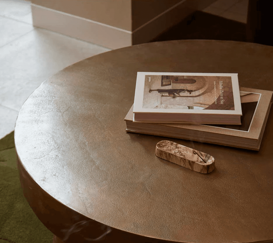 A woman with short hair, eyes closed, exuding a sense of calm and serenity.