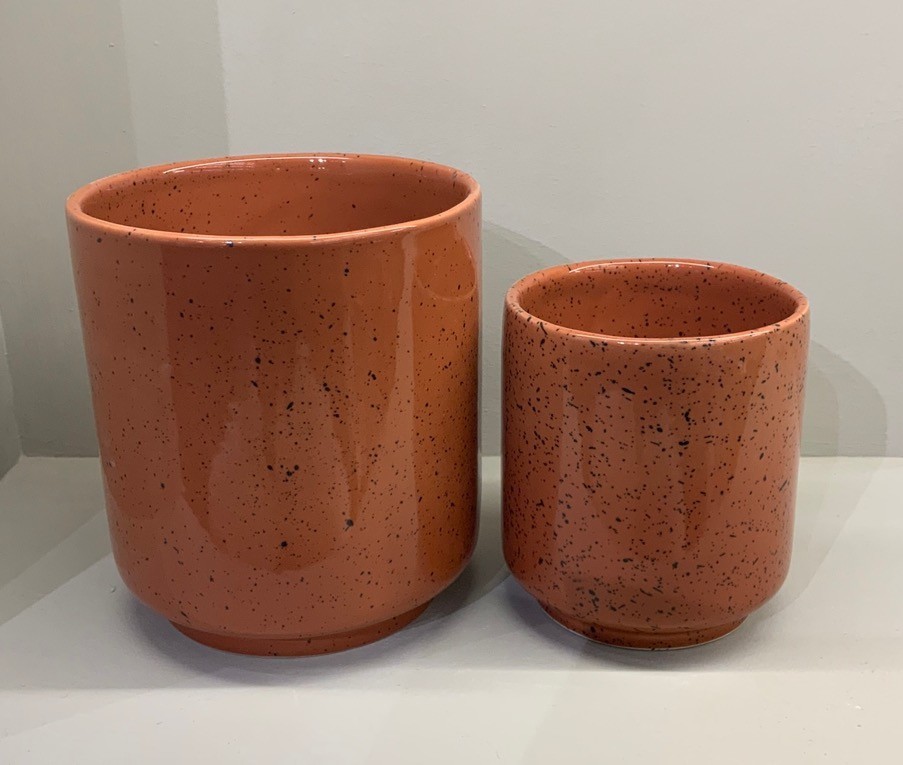 Terracotta colored speckled ceramic planter pots in two sizes