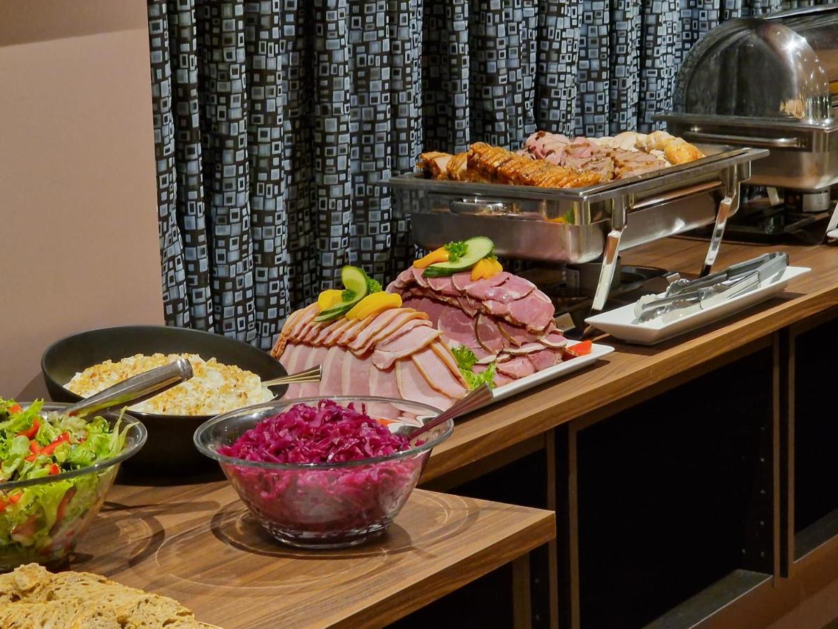 Guests enjoying dinner at Hotel Bifröst restaurant