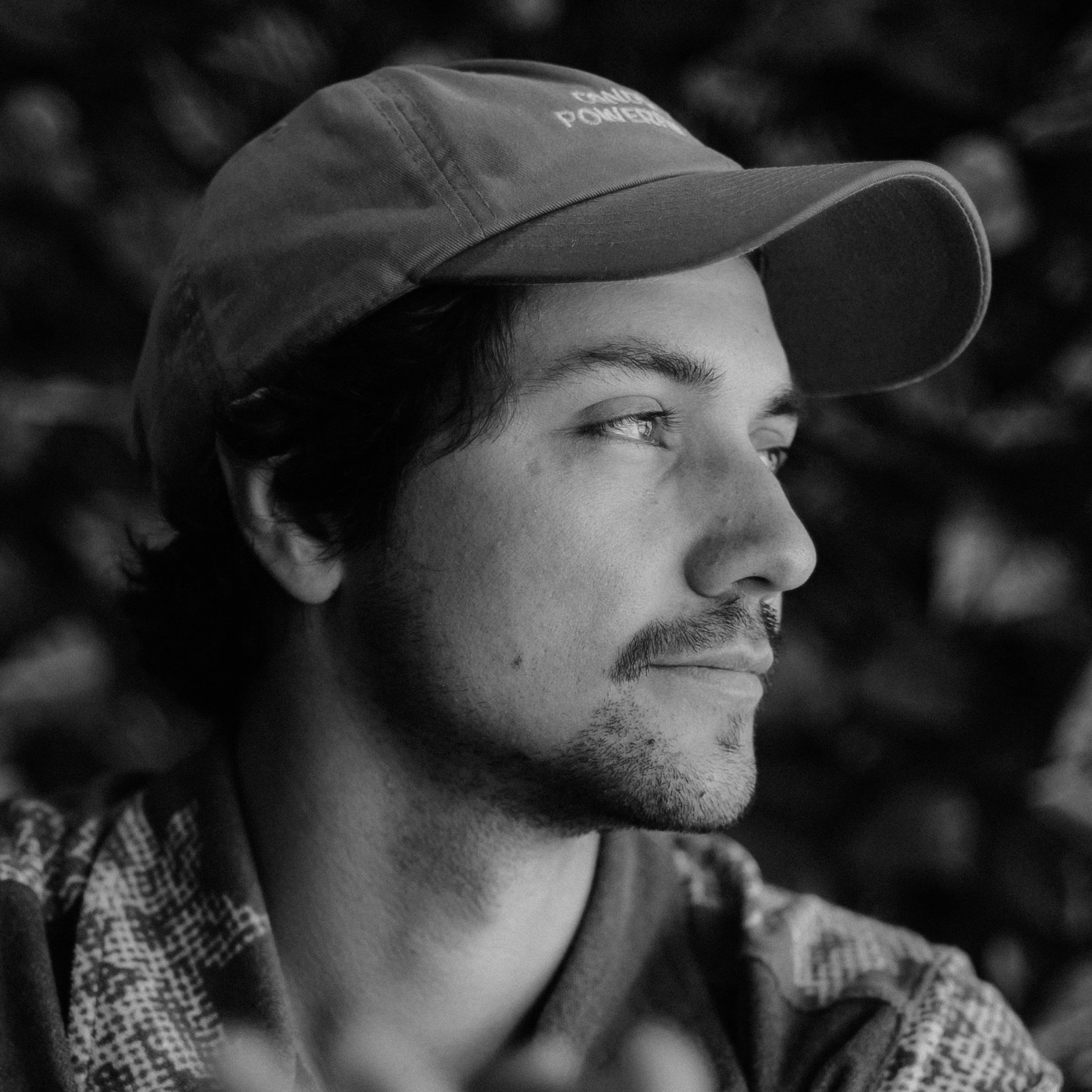 man greyscale smiling artist