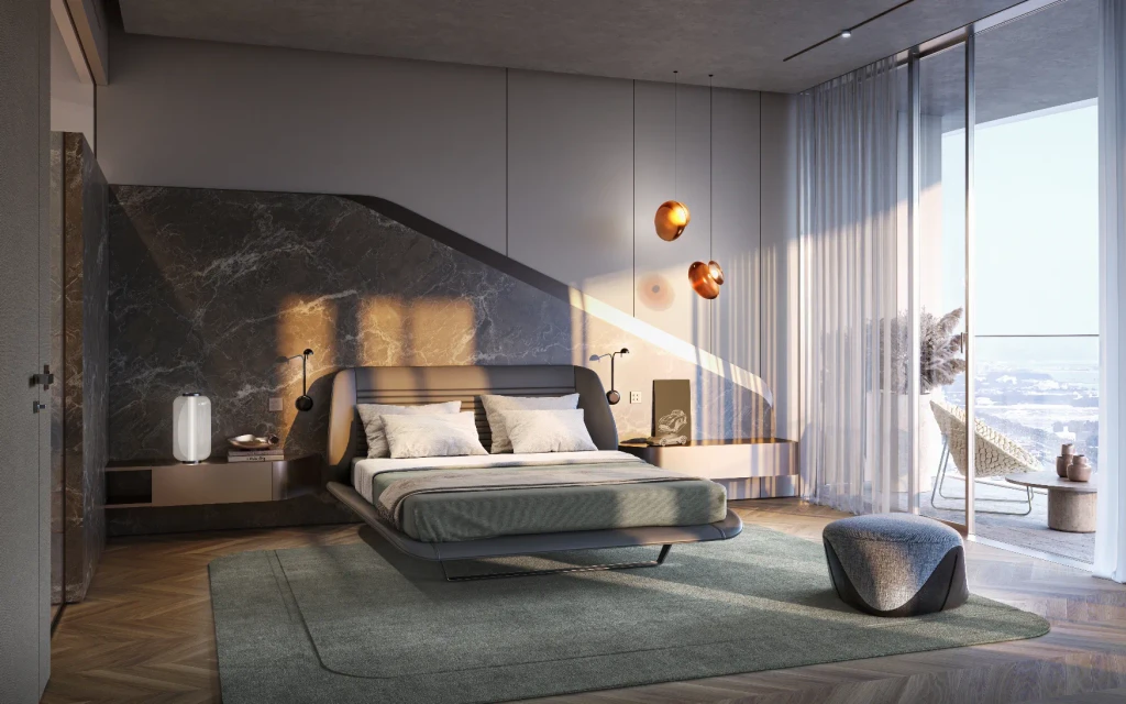 Chic bedroom design with ocean views through large windows, highlighting the luxurious atmosphere of Iconic Residences.