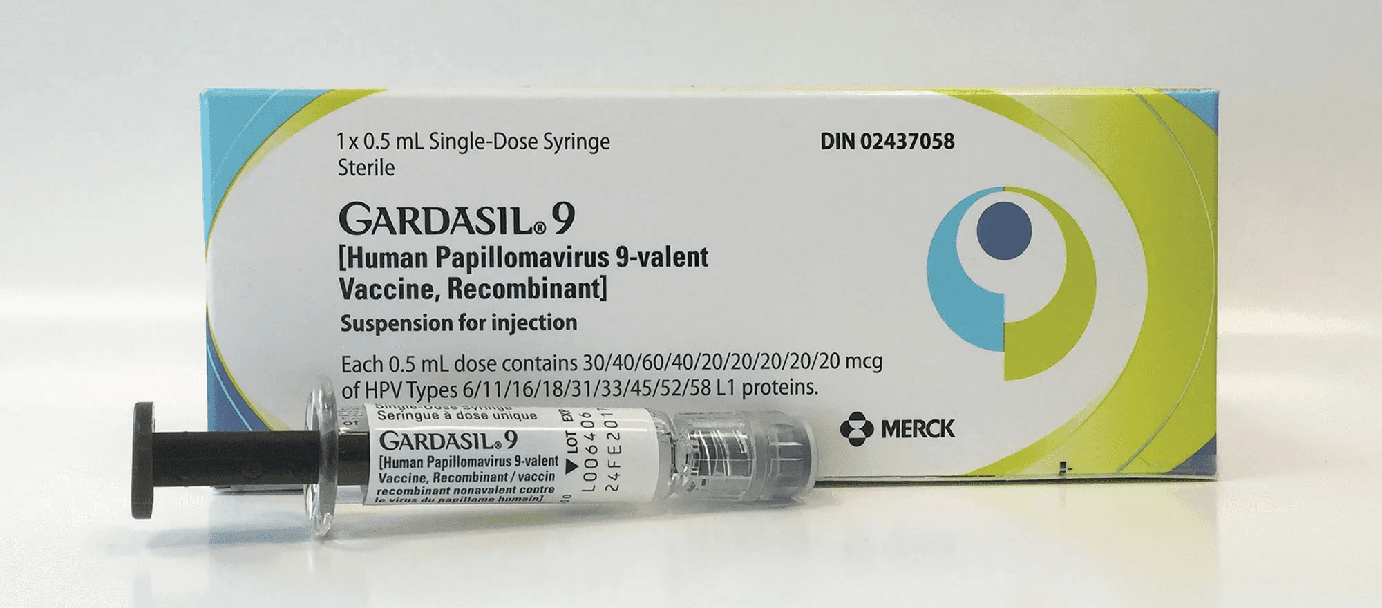 green and silver stethoscope on white plastic table