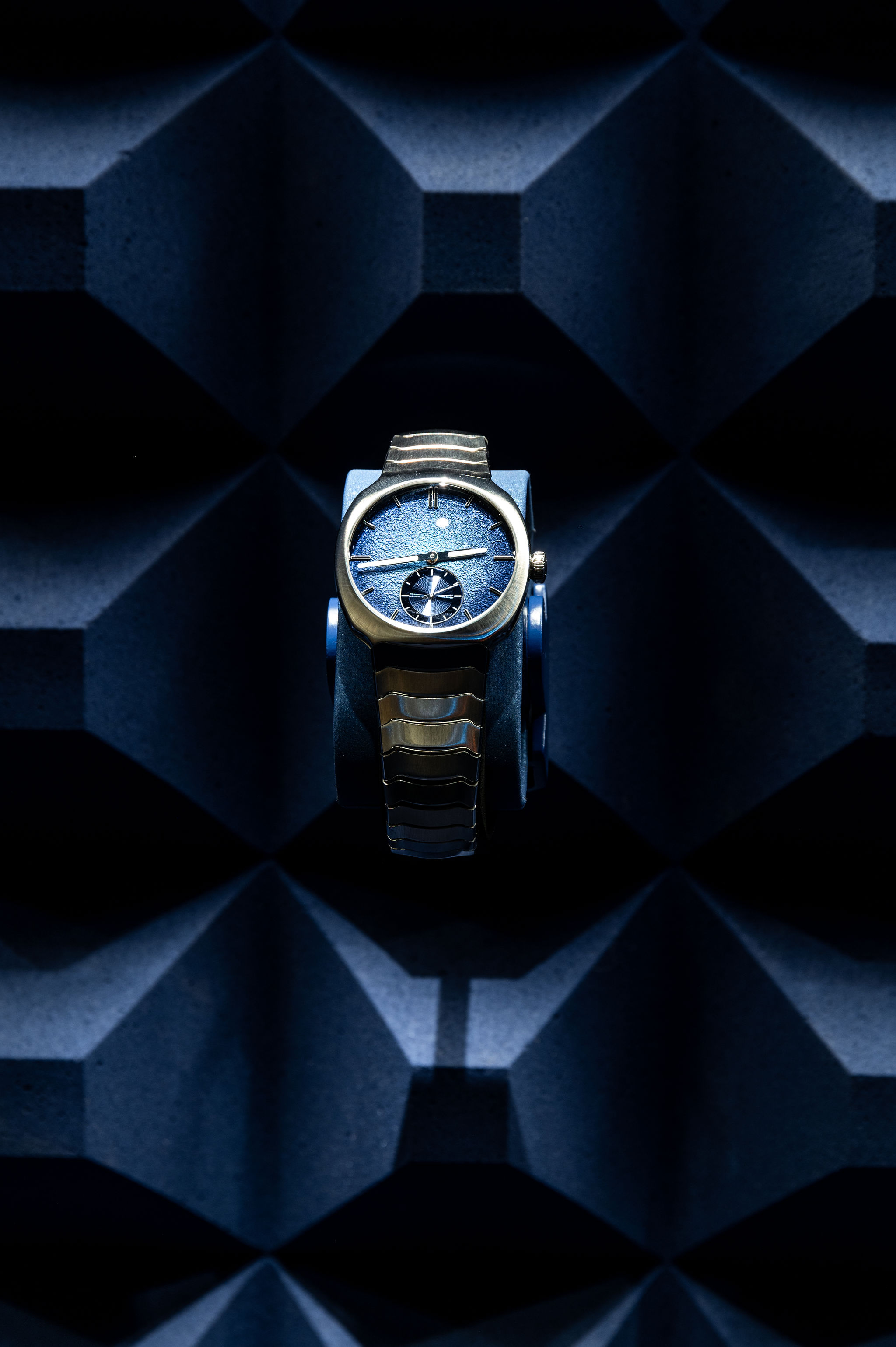 Closup watch and foam eco material of the H. Moser & Cie design retail and creative  concept booth for the Watches and Wonders fair 2024 