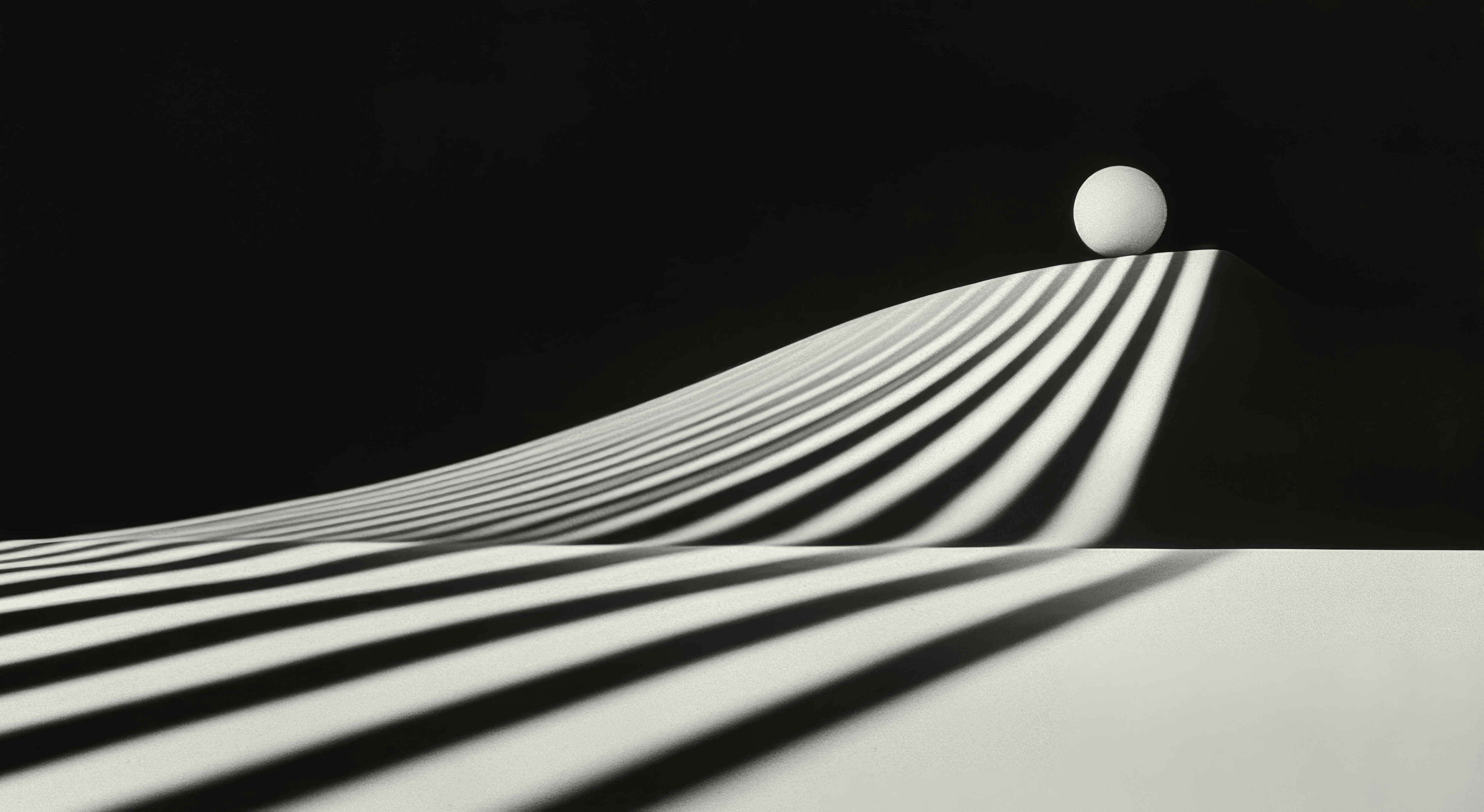 An abstract black and white image of stripes leading to a sphere.