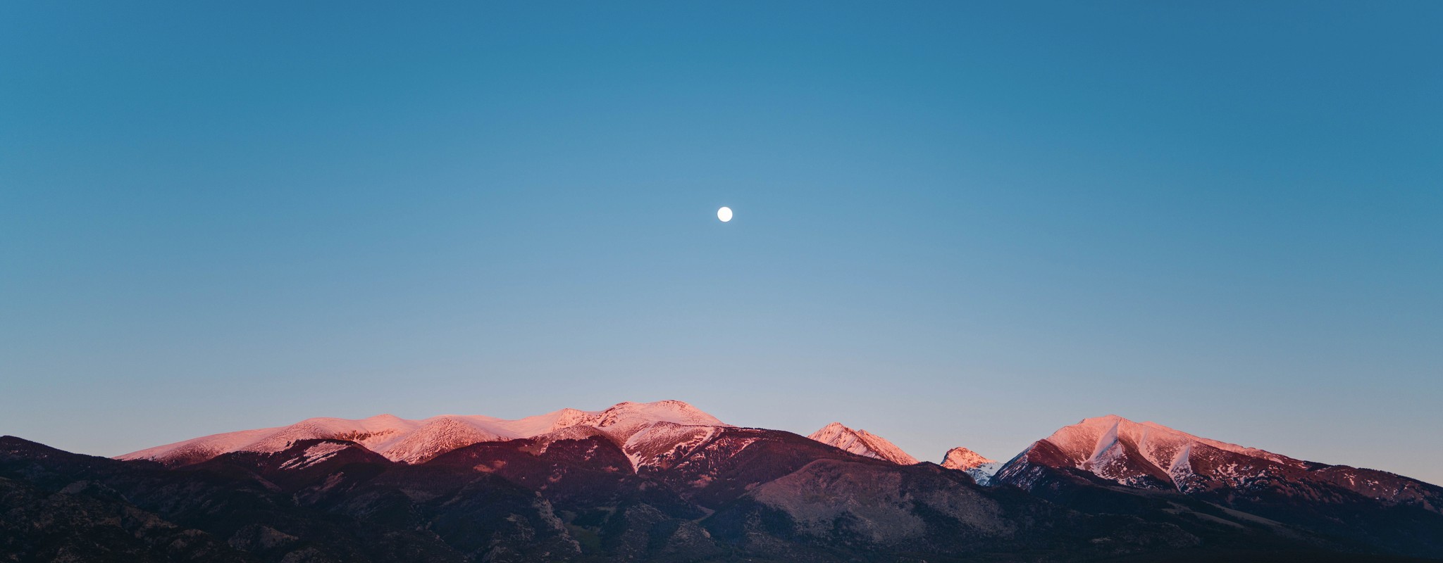 Moon Over Mountains in Colorado near Great Sand Dunes