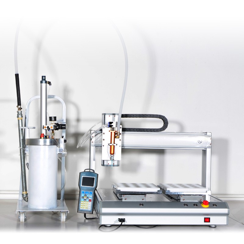 Automated laboratory dispenser system with control unit and digital meter, used for precise liquid handling in scientific experiments.