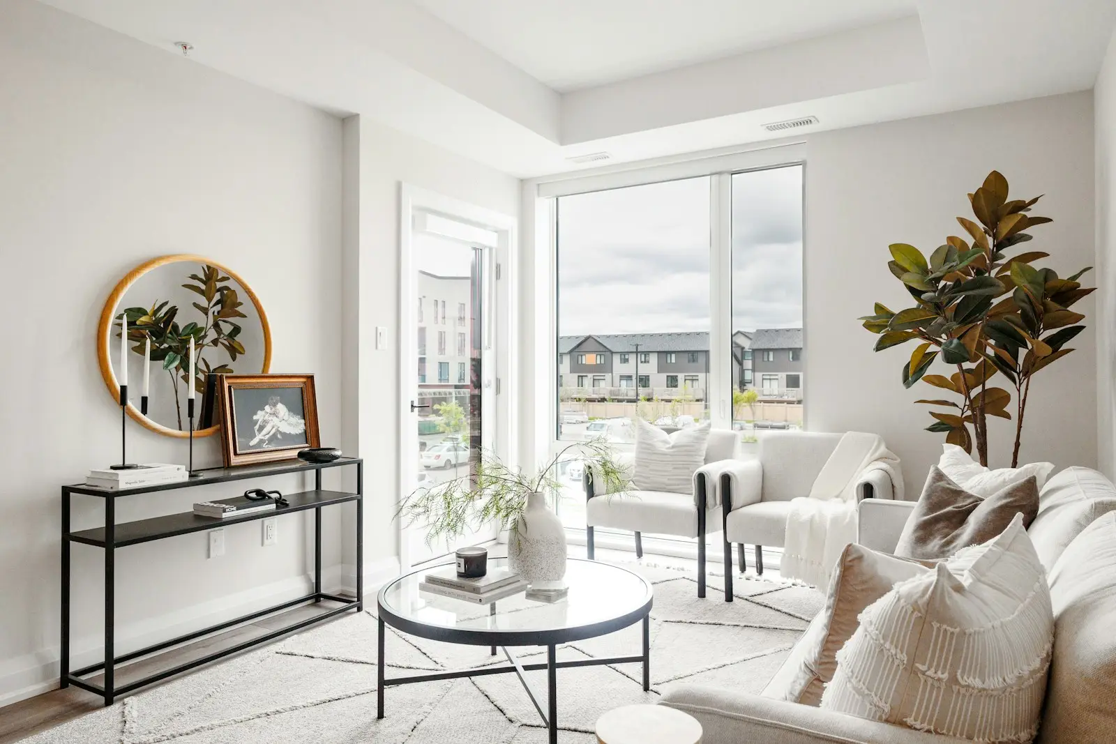 A bright, staged living room in a modern apartment