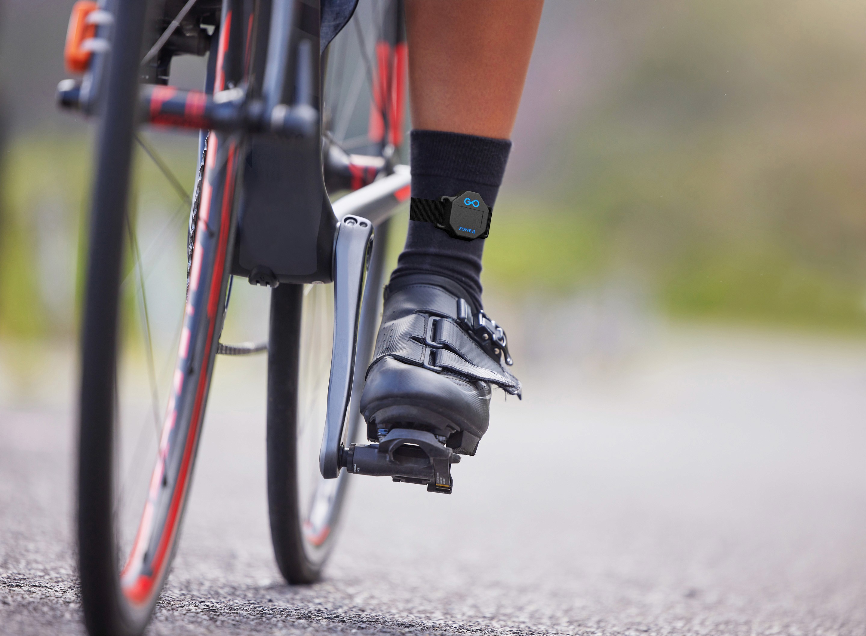 a close up of a persons foot on a bicycle pedal