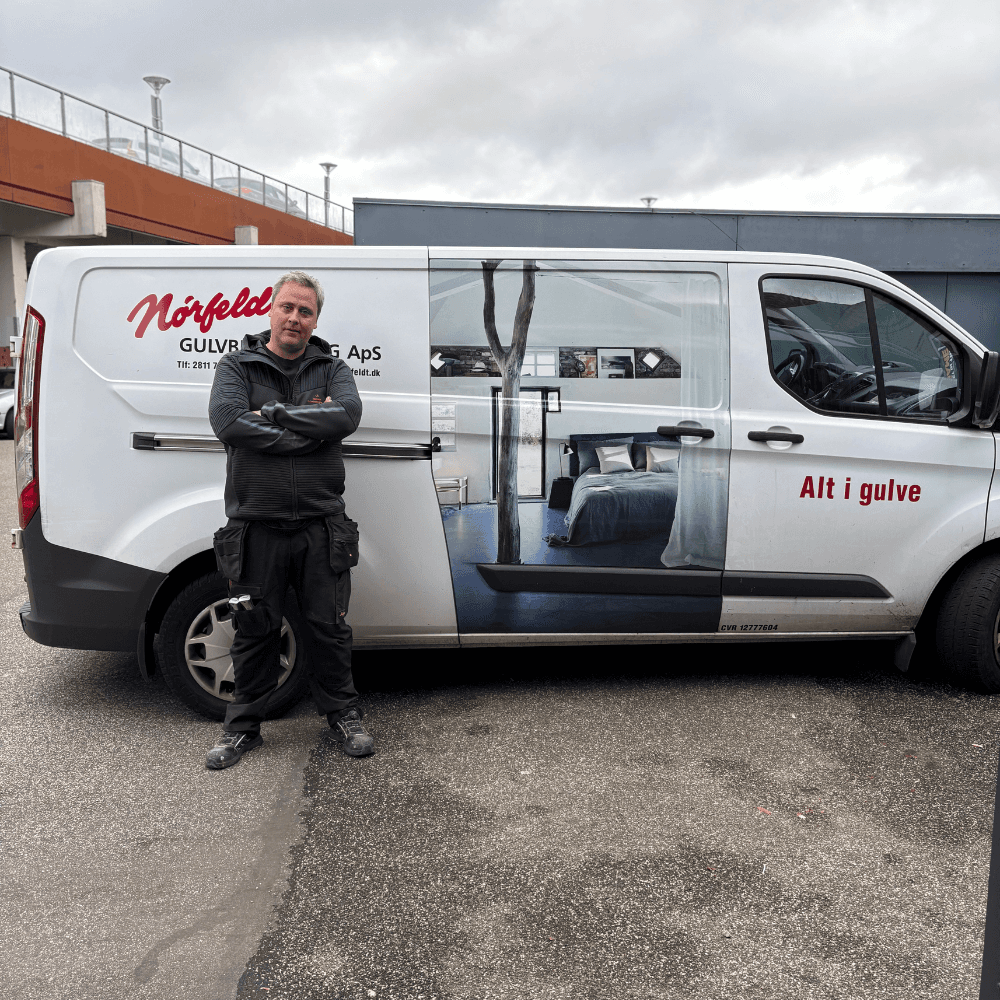 man in black hoodie standing