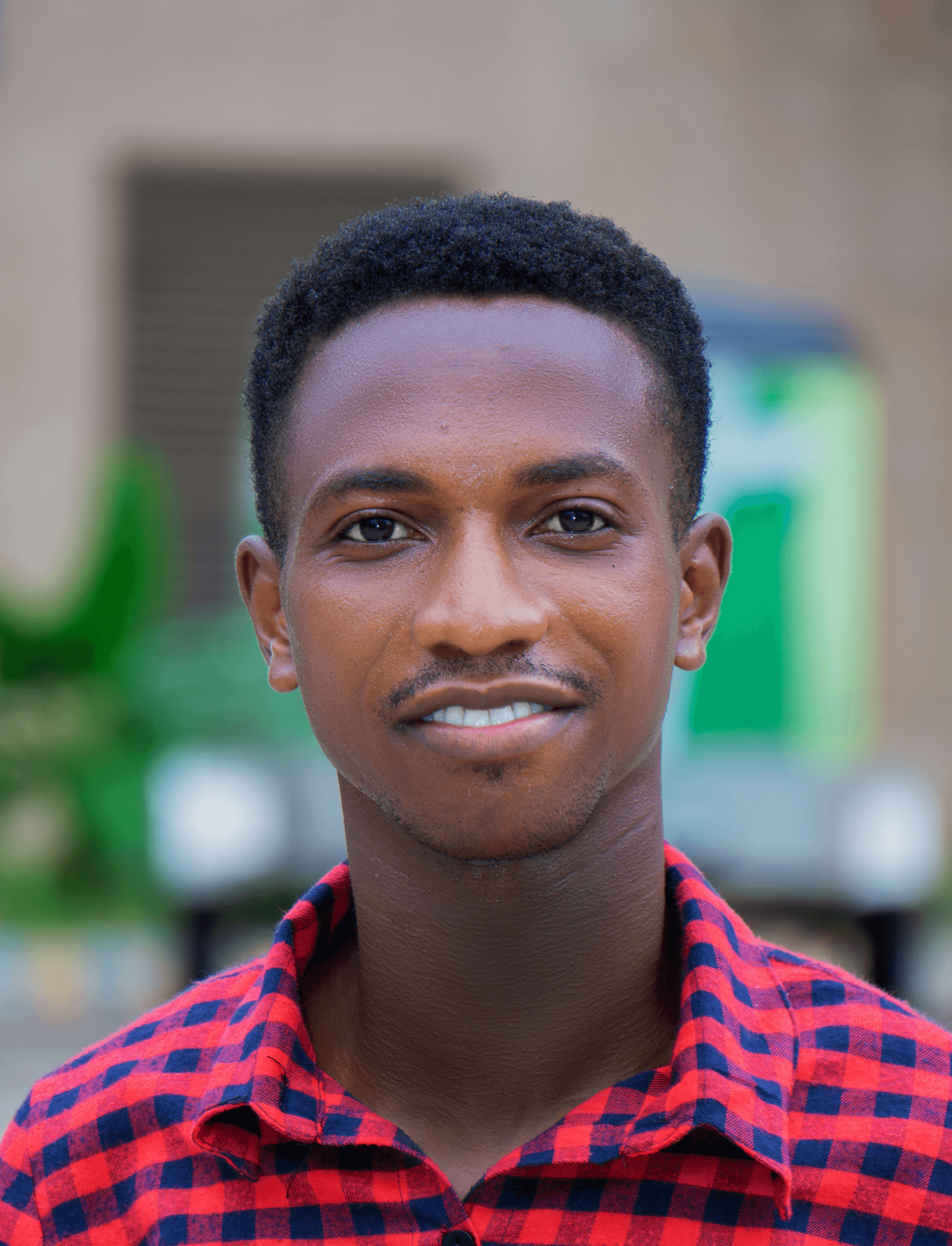 man in red and white checkered button up shirt