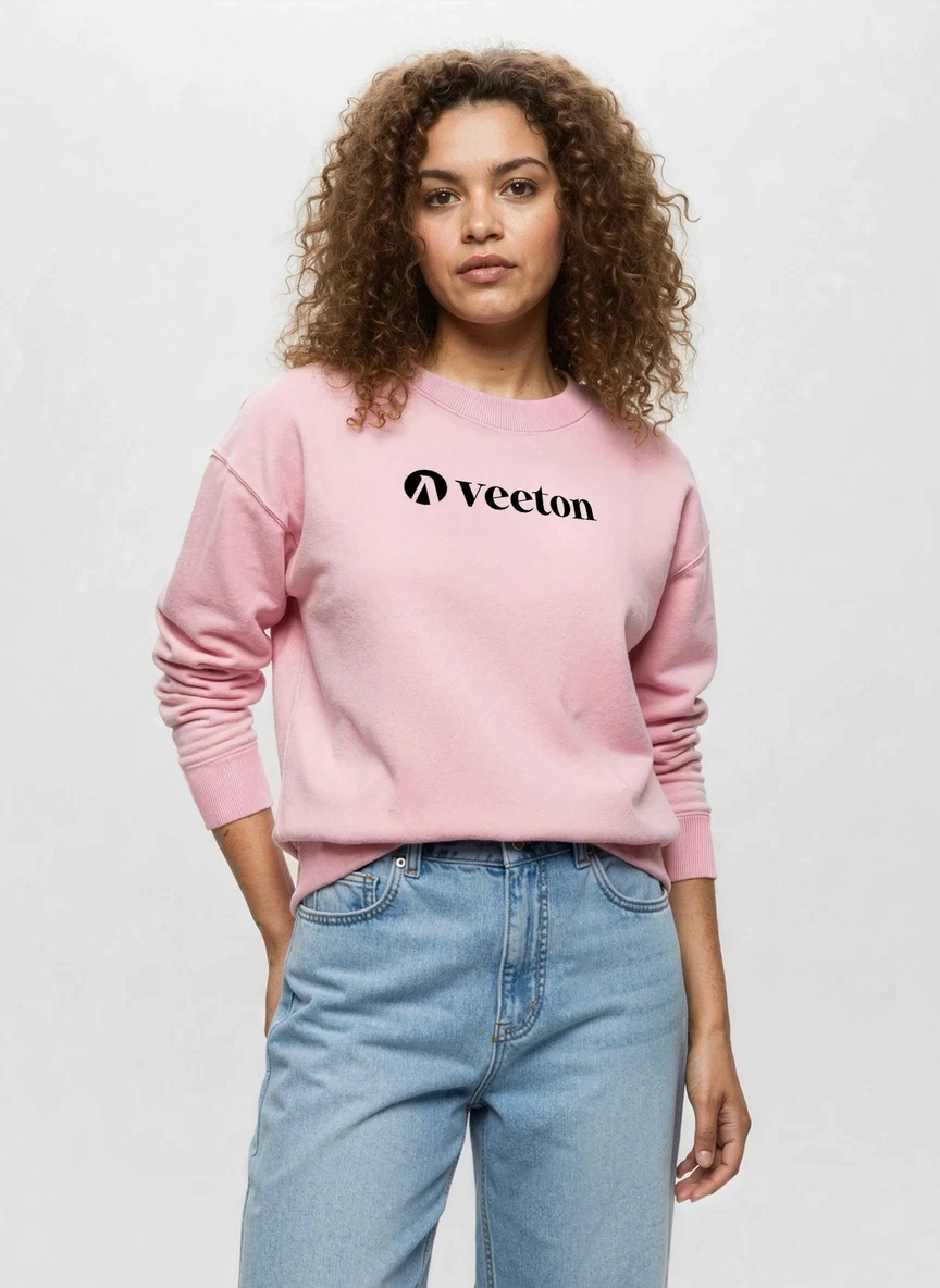 Virtual fashion model with curly hair wearing pink Veeton sweatshirt and light blue jeans