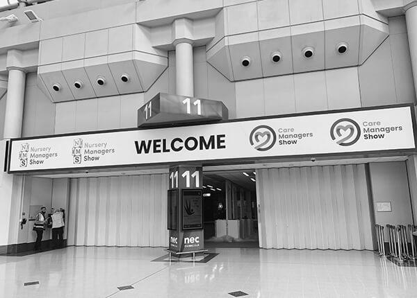 An event welcome sign I designed shown at NEC Birmingham