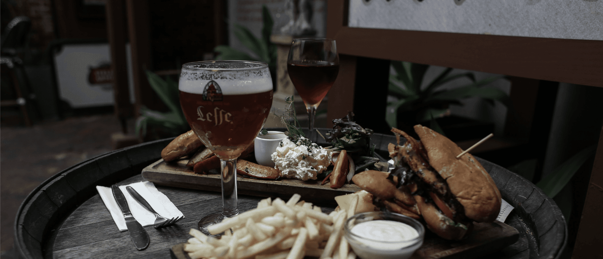 Various foods and drinks on the table.