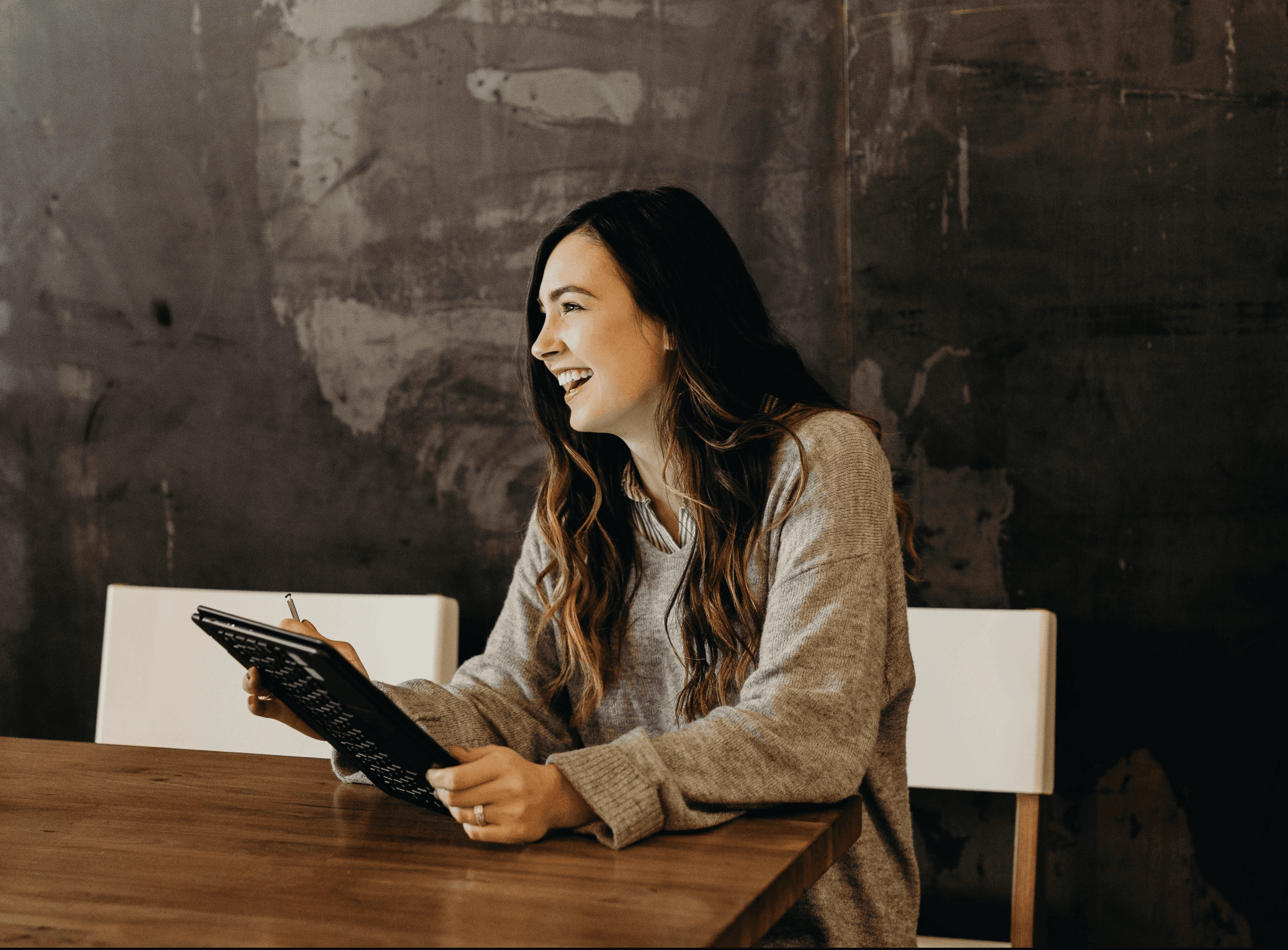 person sitting in a chair in front of a man