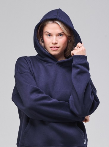 Woman wearing Sunday Superior navy pullover hoodie